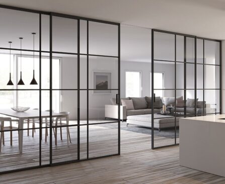 glass room divider with a door